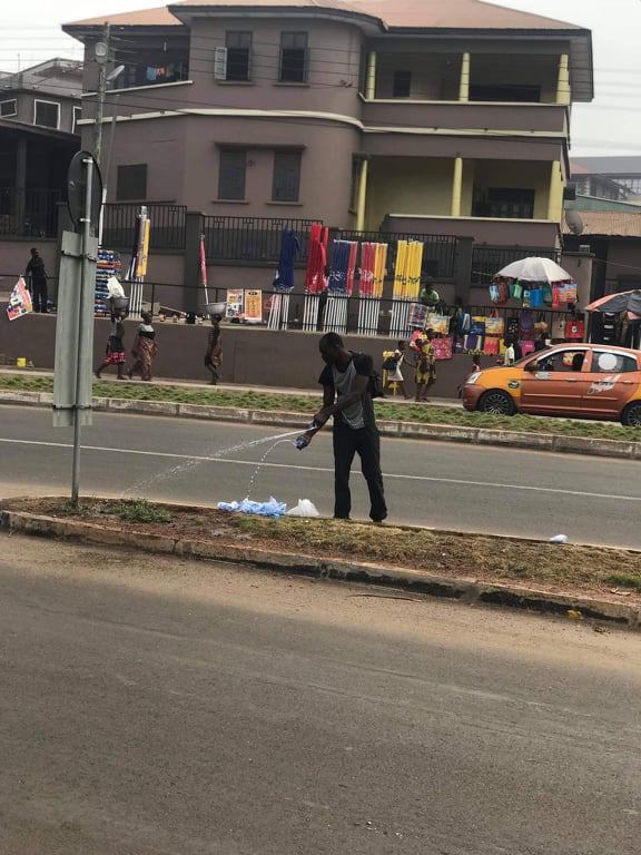 Soldier reportedly punish man walking on the grass at Kumasi-Kejetia Market