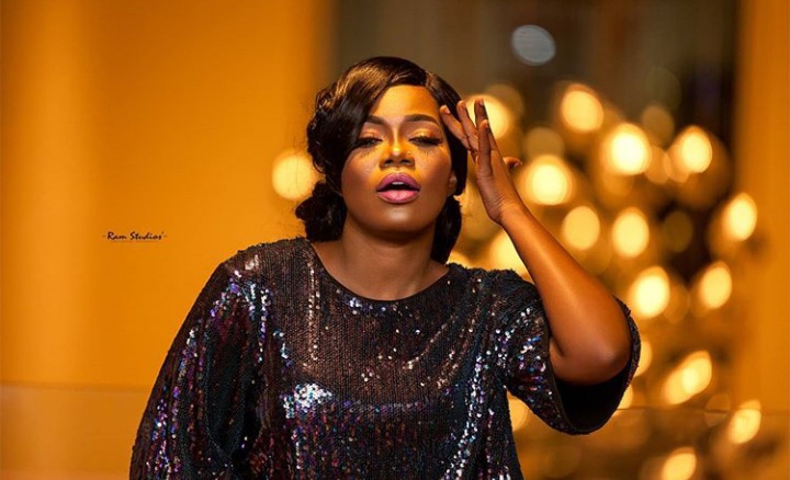 Ghanaian songstress Mzbel has reportedly been arrested by the police and detained at the National CID Headquarters.